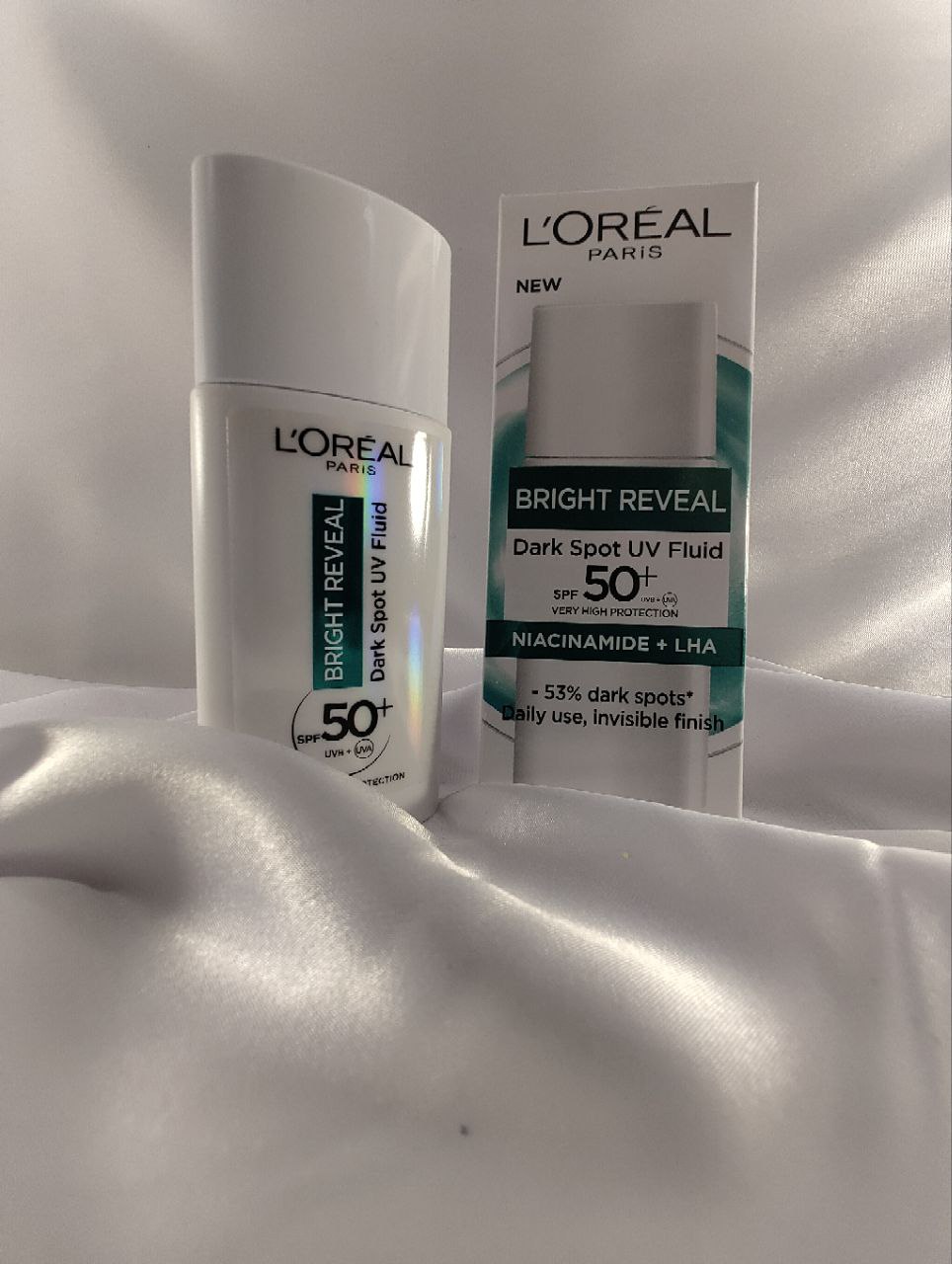 کرم ضد آفتاب فلوییدی ضد لک لورآل پاریس مدل SPF50+ Bright Reveal